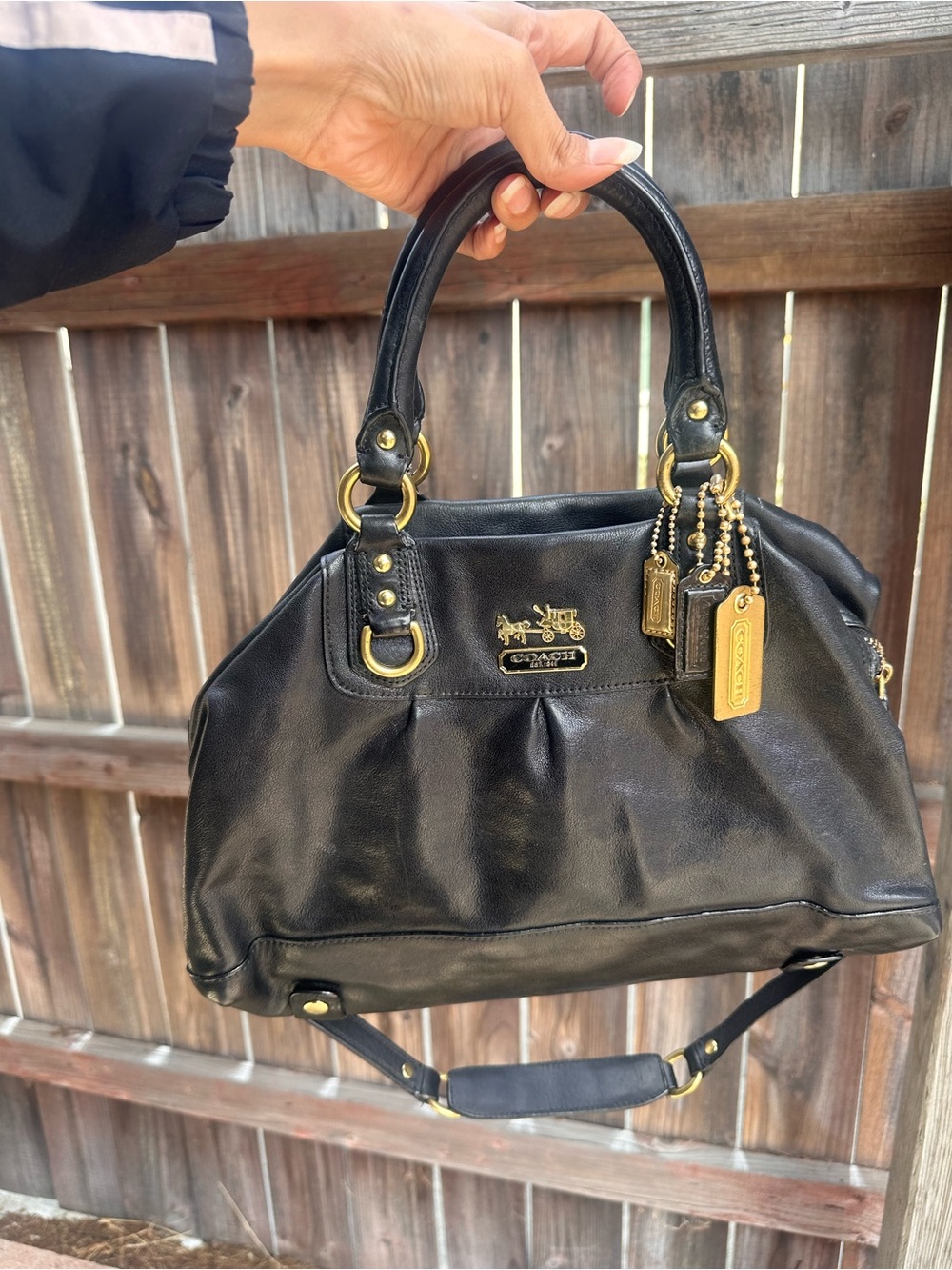 Black leather Coach Madison Sabrina Satchel with gold hardware with dual handles